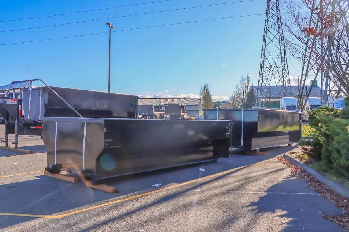 Roll-off dumpster ready for waste disposal at job site for Commercial Dumpster Rental in Carencro